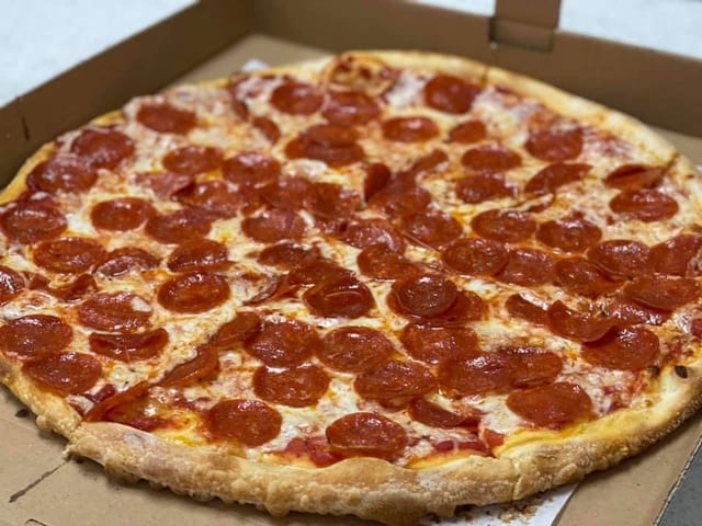 (Family Combo 2) X-Large One Topping Pizza, 12 Wings & 6 Garlic Knots $ 2 Liter Soda Special.