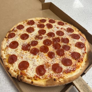 "Family Combo" Large 1 Topping Pizza, 6 Pieces Wings, 6 Garlic Knots & 2 Liter Soda
