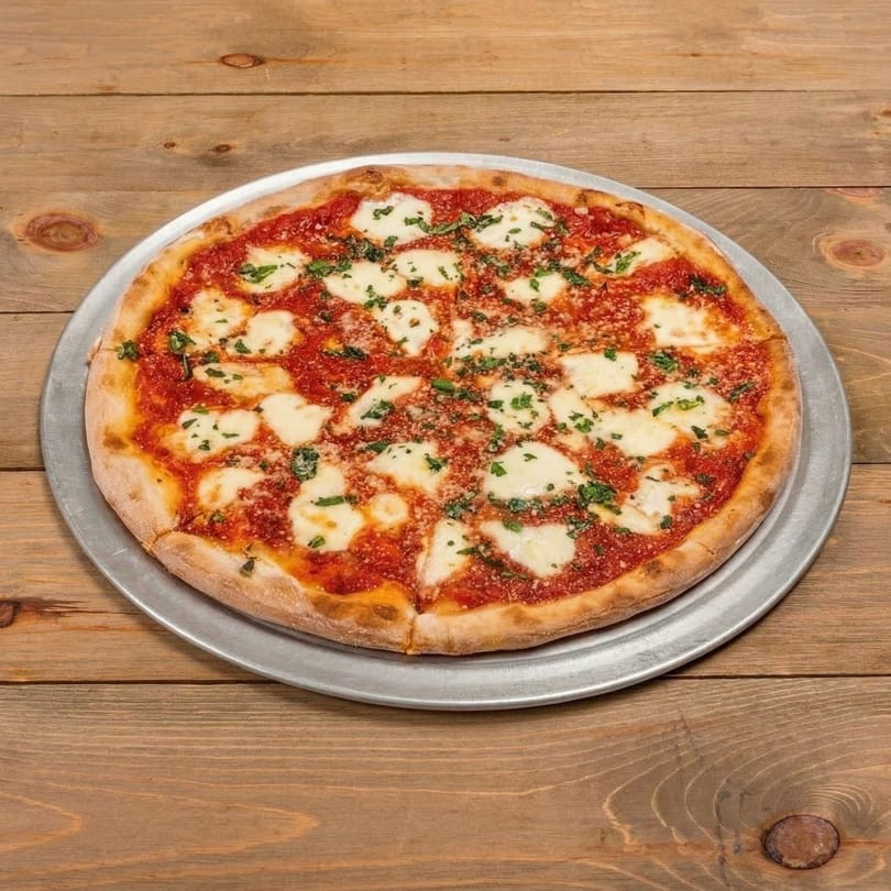 Tomato Joe's New York Pizzeria's Margherita pizza, with fresh mozzarella, tomato sauce, and basil.