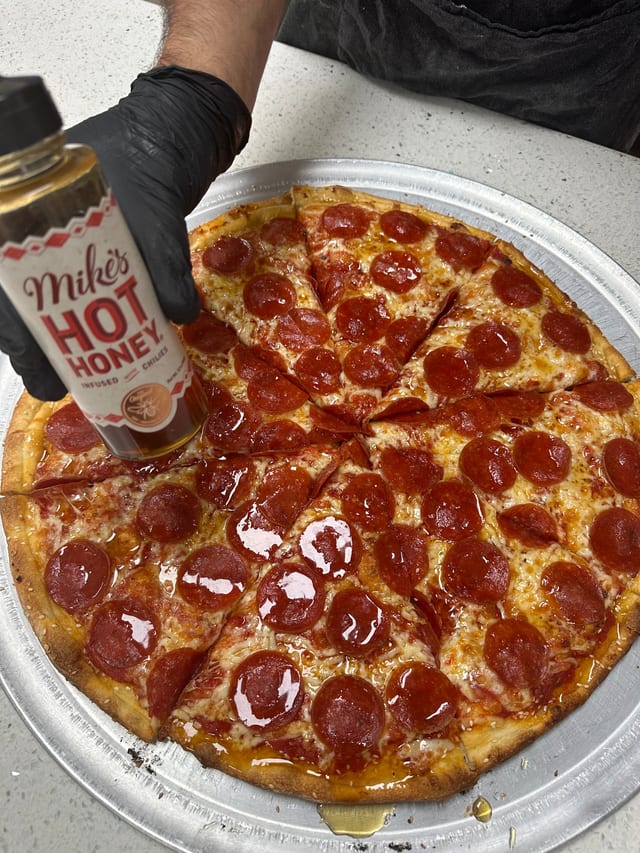 (New Item) Pepperoni Feast with Mike's Hot Honey Sauce.